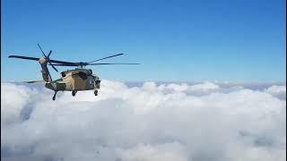 Afghan Air Force UH-60A+ flying over 11000 ft.