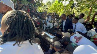 CHAOS AT BRIAN CHIRAS BURlAL  AS HIS BODY WAS LAID TO REST