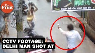 CCTV Man on motorcycle shot at by two gunmen in Delhi