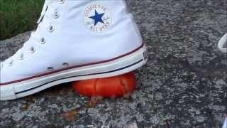 My white Converse stomping on tomato