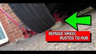 Remove car wheel that is rusted to the Hub top tip