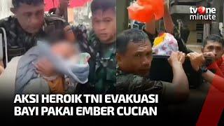 Dramatis TNI Selamatkan Bayi yang Terjebak Banjir di Manado  tvOne Minute