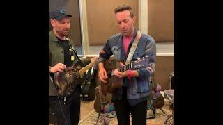 Chris Martin and Jonny Buckland live in the studio