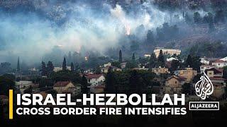 Hezbollah fires 150 rockets at Israel after senior commander killed