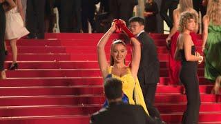 Cannes Woman pours fake blood on herself on Palais des Festivals steps  AFP