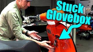 Fix a Glove Box Door That Will Not Open On a Vespa Primavera or Sprint