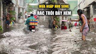 Người dân ngán ngẩm cảnh cứ mưa là ngập như sông giữa Sài Gòn