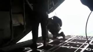 Jumpmaster Gets Sucked Out of a Plane When His Parachute Deploys Early