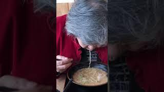 Mother in law eating Japanese Ramen