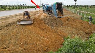 New Activity Pour Soil To Clear Lowland areas​ Near the highway By old bulldozer with dump truck