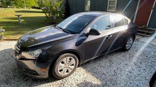 Buying fixing  and driving a $1000 Chevrolet Cruze