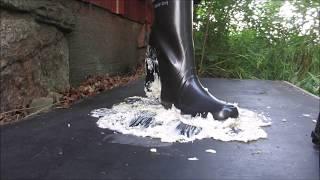 Stomping on food with rubber boots