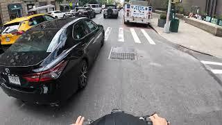 Riding a Bike in Manhattan New York City  Bike Messenger Riding Fast and Fluid Through NYC Traffic