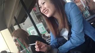 Japanese woman smokes a cork-tipped cigarette