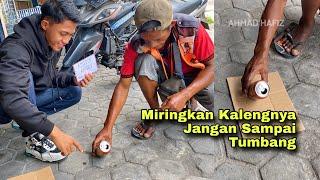 Posisikan Kalengnya miring jangan sampai Jatuh