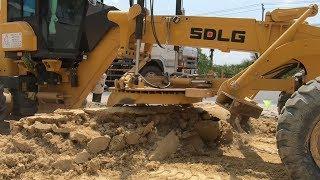 Road Construction Heavy equipment Moto grader SDLG in operation road construction in Cambodia