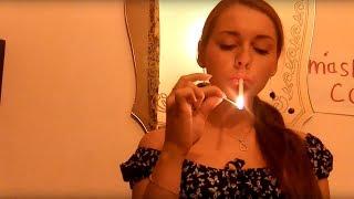 Young women experiments with smoking