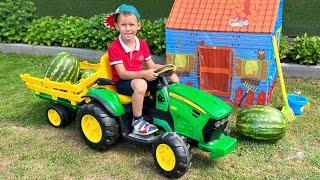 Sofia and Max pick vegetables on the farm and ride on childrens toy tractor