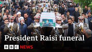 Mourners in Iran attend President Raisis funeral procession  BBC News