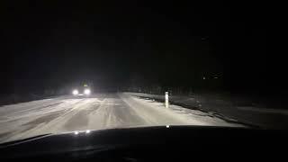 BMW i4 M50 Adaptive Laser Headlights on snowy road. 4K HDR.