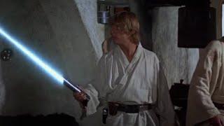 STAR WARS Ep.4 Una nuova speranza1977Luke Skywalker riceve la spada laser da Obi Wan KenobiITA