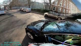 Tesla driver pushed into the lane I was in. 20 mph road moving faster than 20 mph. LD20GUW