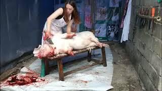 699 Woman after slaughtering pig