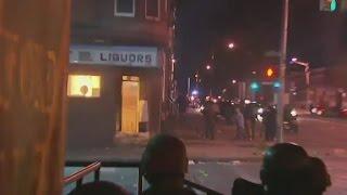 Liquor store on fire chaos on Baltimore streets