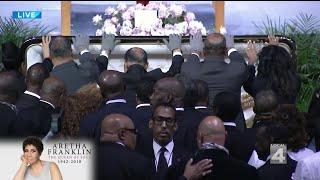 Family lowers Aretha Franklins casket at Greater Grace Temple