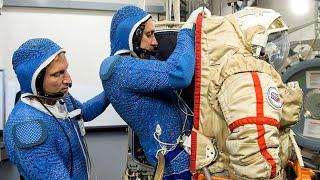 Astronaut Demonstrates How A Space Suit Works