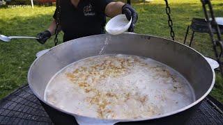 Kulish - Ukrainian street food  Zaporozhian Cossacks food  in huge cauldron