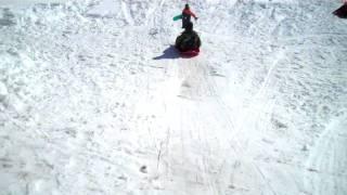 Connor jumping on sled