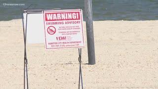 What causes swim advisories to be issued at beaches?