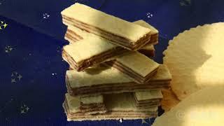 Homemade crispy wafer sheets filled with hazelnut cream