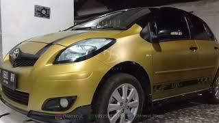 Toyota yaris dipasang sticker gold dofffull wrapping