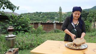 Traditional Azerbaijani dessert Nabat  Walnut sugar and samovar tea in the village