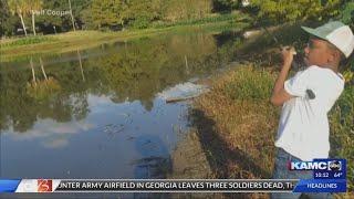 Moment captured after little boy catches a big fish