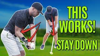 GOLF How To Stay Down Through Impact In The Golf Swing