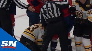 Brad Marchand Drops Brenden Dillon With Shot To Midsection After Scrum