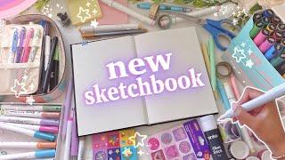 starting & customising my new sketchbook  drawing on the cover first page & more