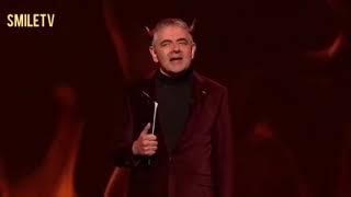 Rowan Atkinson. The devil. Stand up. Try not to laugh.