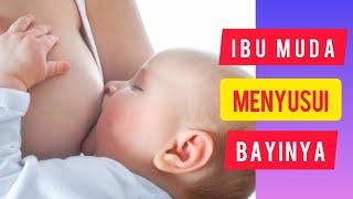 Ibu Muda Cantik Lagi Menyusui Bayinya