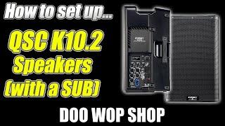 How to use the QSC K10.2 powered speaker with a subwoofer