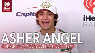 Asher Angel Tests His Luck in the Wheel of Fun at the 2021 iHeartRadio Music Festival