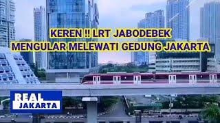 KEREN  SAAT LRT JABODEBEK MENGULAR MELEWATI GEDUNG TINGGI JAKARTA
