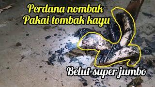 berburu ikan diparit pinggir jalan