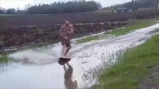 Queenslander Makes Most of Cyclone Owen by Skimboarding in Flooded Paddock