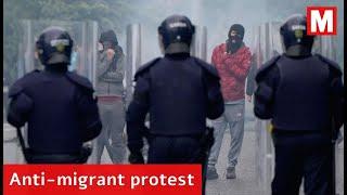 Anti-migrant protesters clash with gardai in Coolock