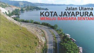 Jalan Utama Kota Jayapura Menuju Abepura Waena dan Bandara Sentani Mulus Berkelok di Tepi Danau