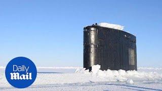 USS Hartford surfaces at the Arctic Circle during Ice Exercises - Daily Mail